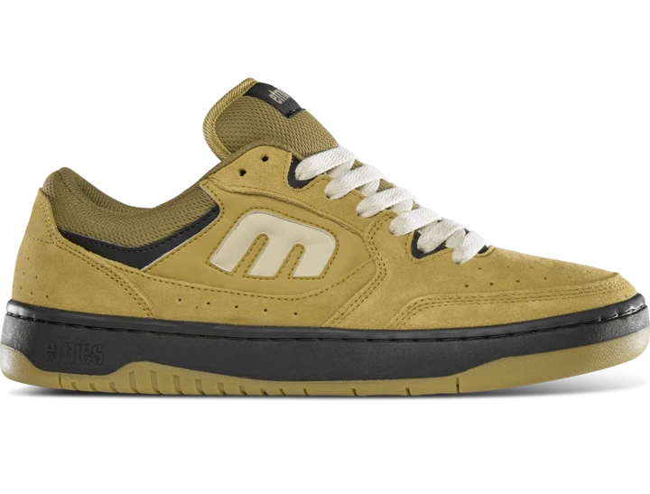 etnies Loot Shoe in brown with mid-puff silhouette, suede upper, and retro-inspired court shoe design reimagined for modern skate style.
