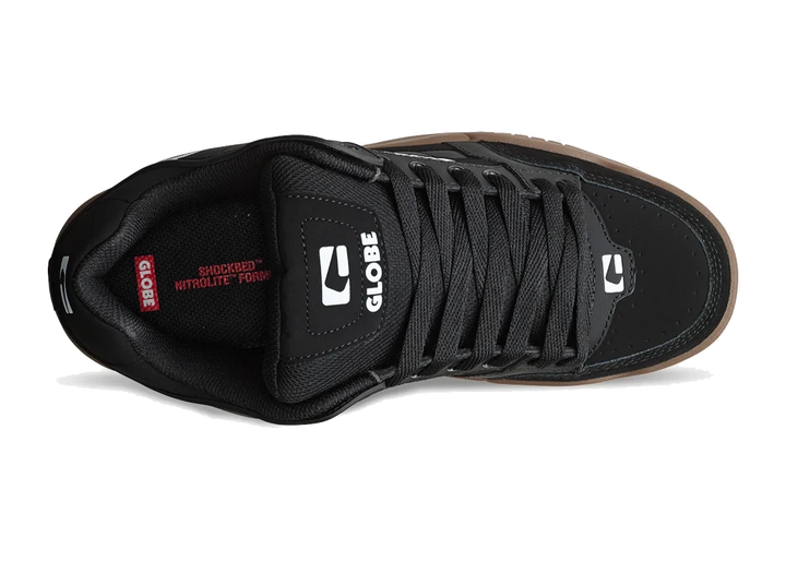 Black sneaker with visible Globe branding on a white background