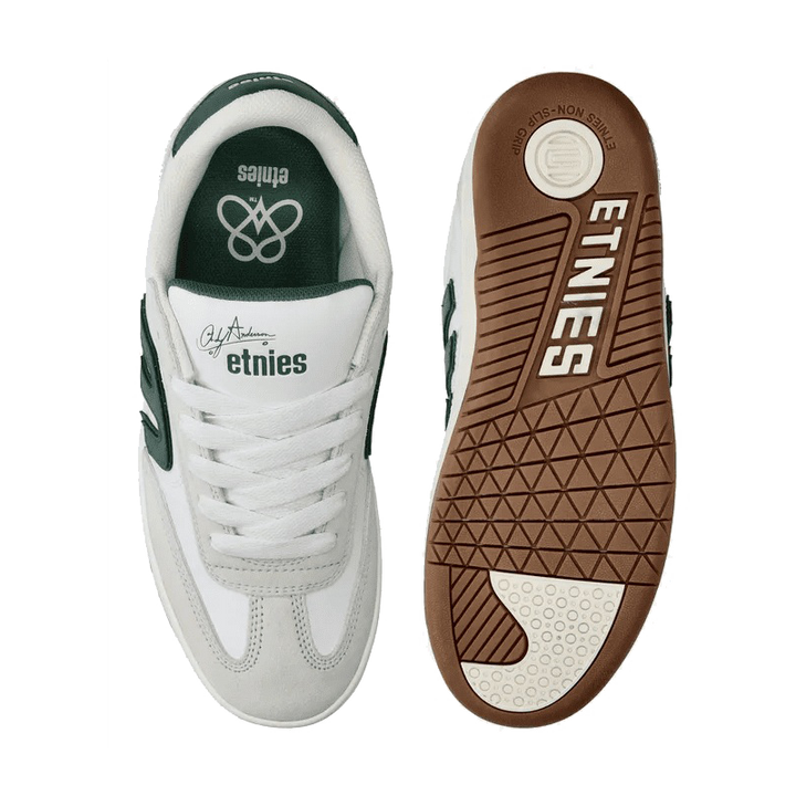 A pair of Ethnies sneakers shown from the top on a white background, with one shoe displaying the white and dark green upper and the other showing the brown outsole.
