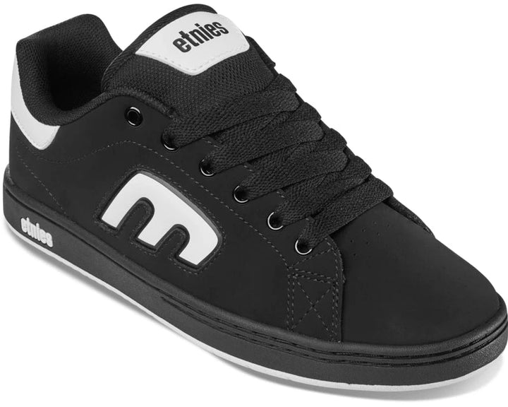 Black sneaker with white accents on a white background