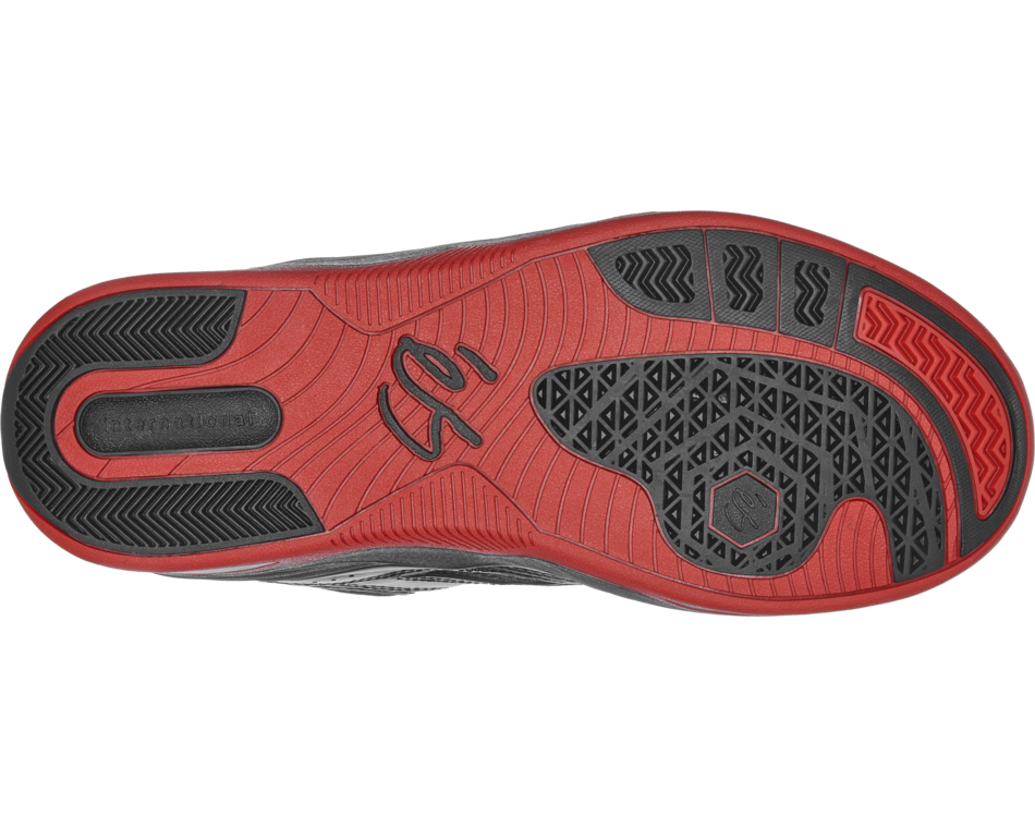 Red and black athletic shoe sole on a white background