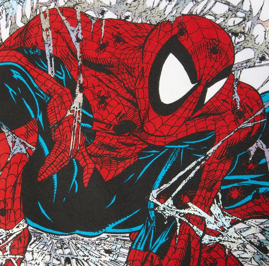 Close-up of Spider-Man in a red and blue costume with web patterns.