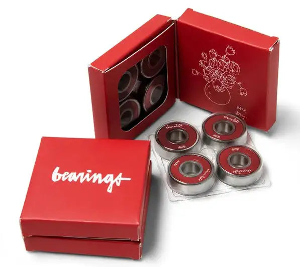Chocolate ABEC 5 skateboard bearings with red removable shields and packaging