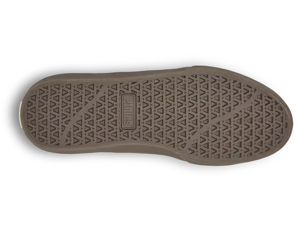 The outsole of a brown shoe, featuring a textured triangular tread pattern and a central embossed brand logo that reads 'BIRCH'.