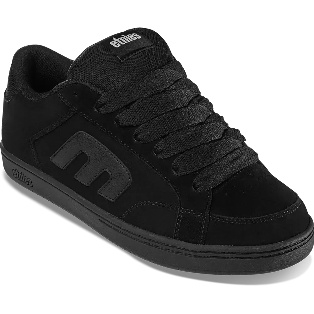 Black sneaker with brand logo on a white background