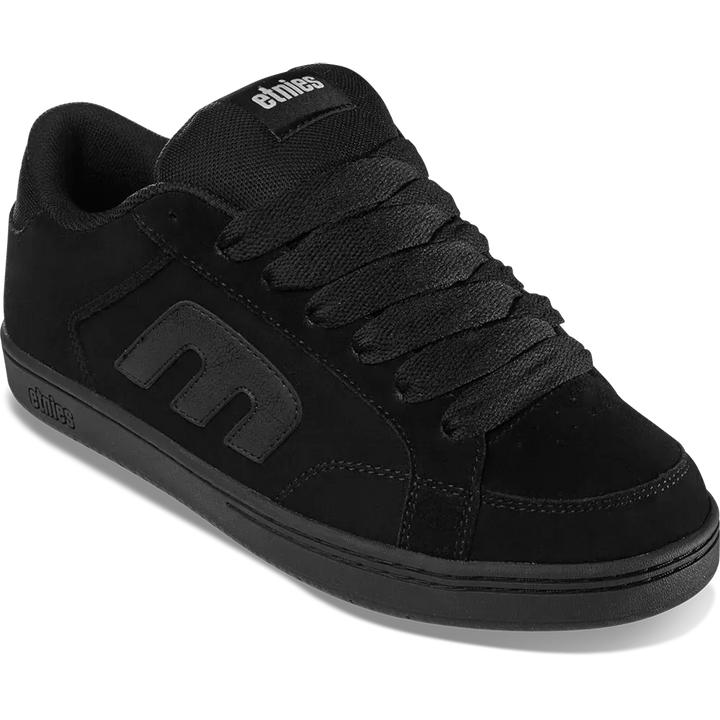 Black sneaker with brand logo on a white background