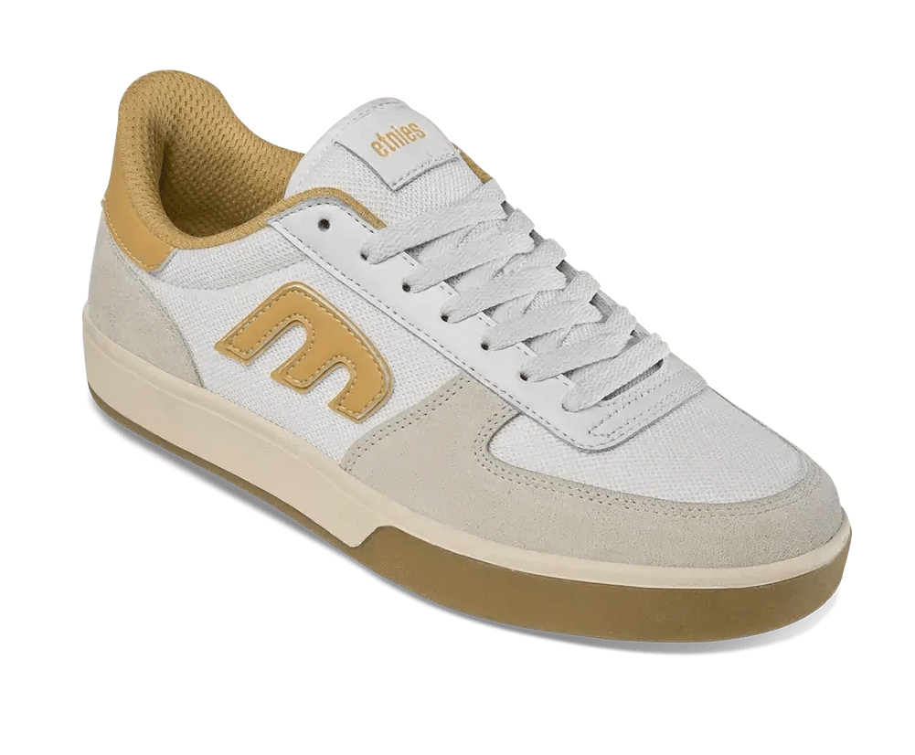 White and beige sneaker with brand logo on a white background