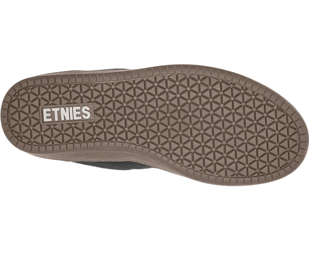 Etnies logo on the sole of a shoe