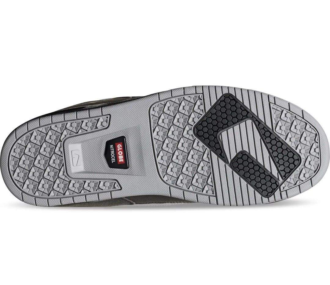 The bottom sole of a shoe, featuring a textured gray and black tread pattern with a visible K-Swiss logo and a small red and black K-Swiss Innovations label.