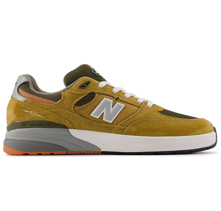 New Balance Numeric 933 Andrew Reynolds shoe in camel and dark brown with suede upper, cupsole support, and pro-level skate design.