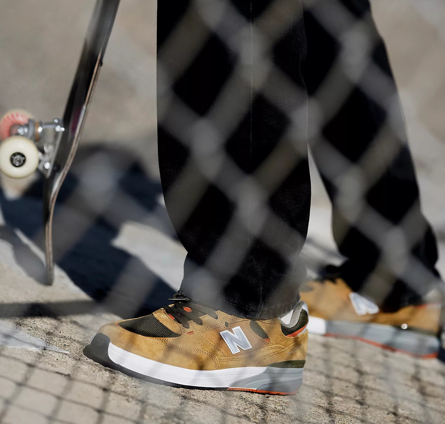 New Balance Numeric 933 in Camel/Dark Brown is Andrew Reynolds’ signature shoe—built with durable suede, impact support, and crisp skate style.