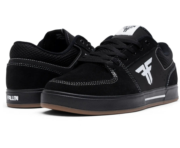 Black sneakers with a brand logo on a white background