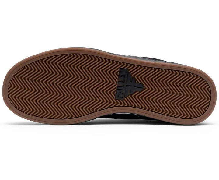 Sole of a shoe with a brand logo on a white background