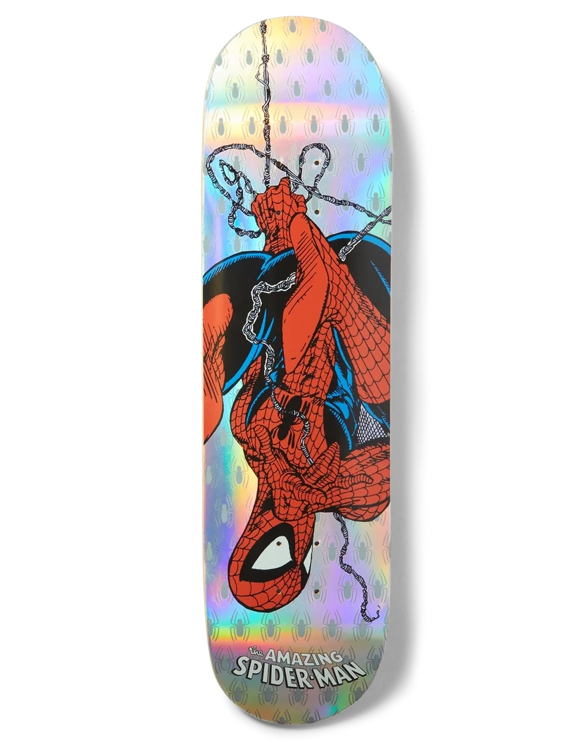 A skateboard deck featuring a holographic iridescent background with a graphic of Spider-Man hanging upside down, with the text 'AMAZING SPIDER-MAN' at the bottom.