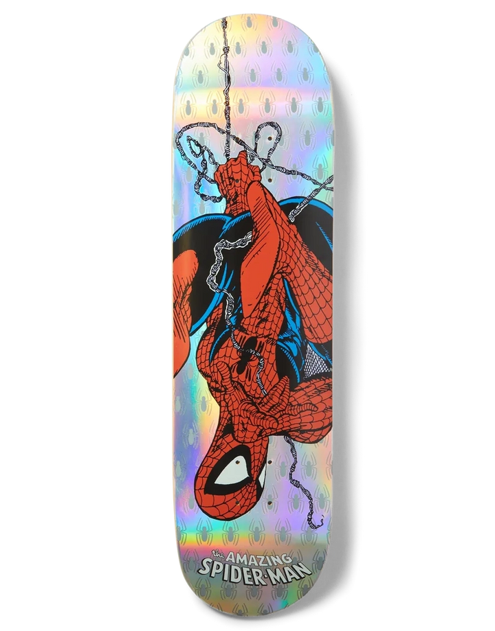 A skateboard deck featuring a holographic iridescent background with a graphic of Spider-Man hanging upside down, with the text 'AMAZING SPIDER-MAN' at the bottom.
