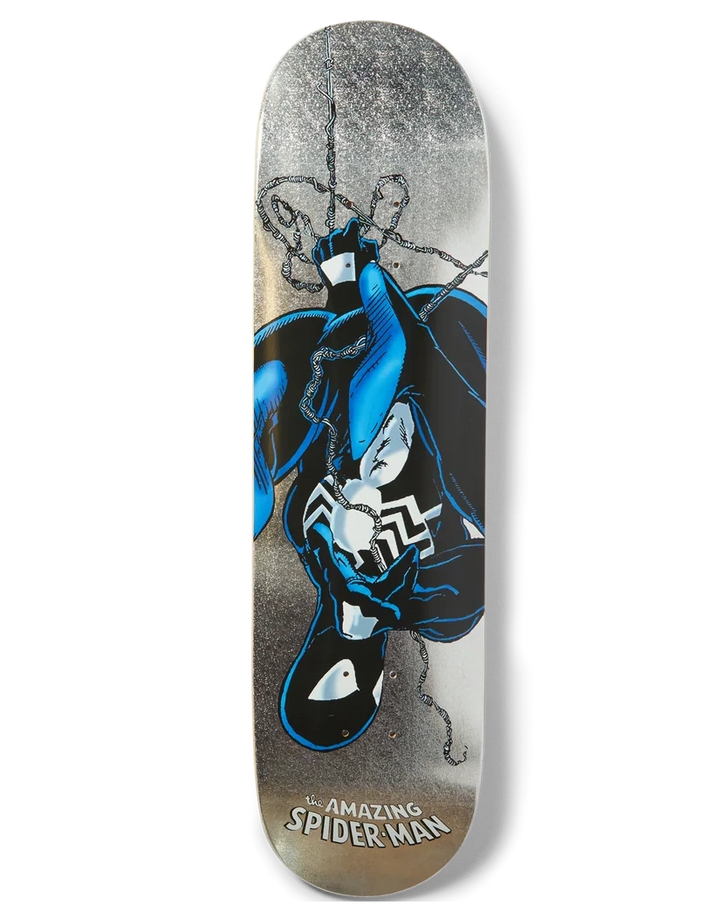 A skateboard deck featuring a graphic illustration of the character Venom in blue and black, set against a distressed gray and brown background with 'The Amazing Spider-Man' text at the bottom.