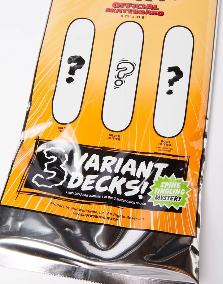 A sealed retail package for a skateboard mystery bag. The front card is bright orange with three white slots showing question marks, large text reading '3 VARIANT DECKS!', and a green 'Spine Tying Mystery' badge.