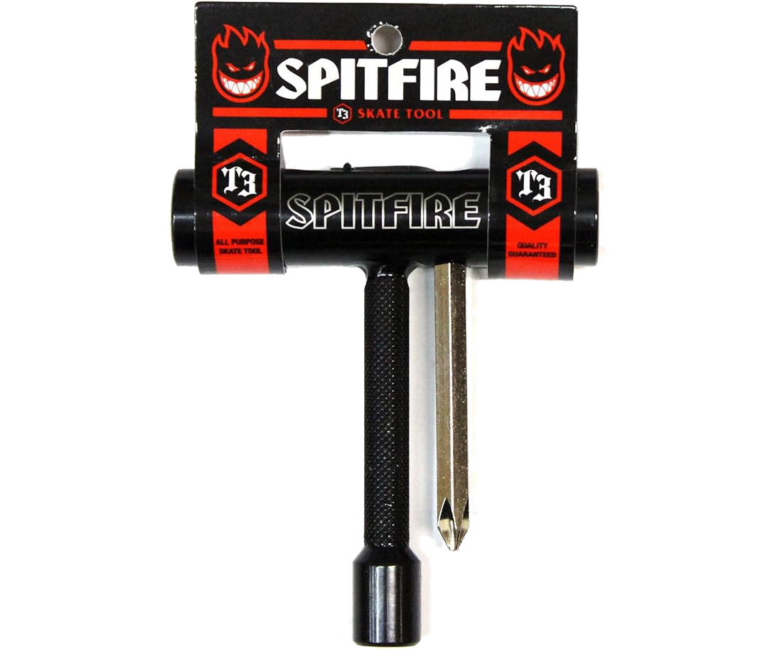 A Spitfire T3 Skate Tool with a black handle, two metal driver bits, and its branded black and red cardboard packaging, shown against a plain white background.
