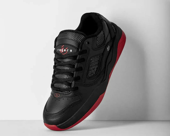 Black and red sneaker on a light gray background