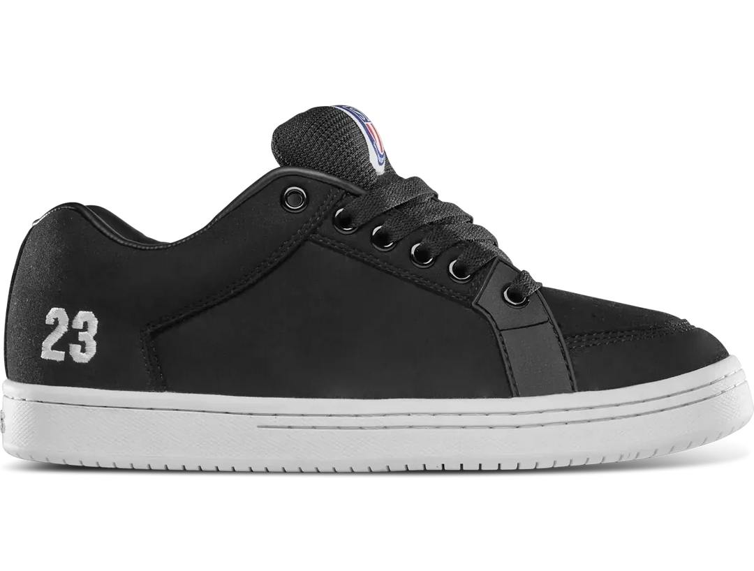 Black Etnies Sal 23 skate shoe with white outsole and Sal Barbier detailing