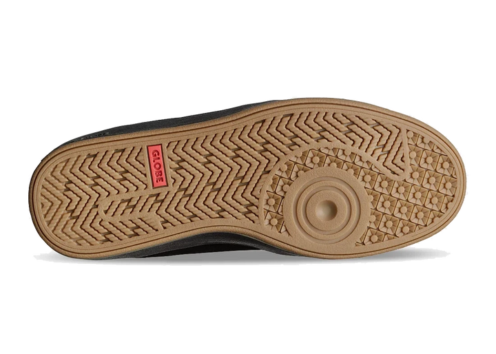 Close-up of a shoe sole with a brand logo on a white background