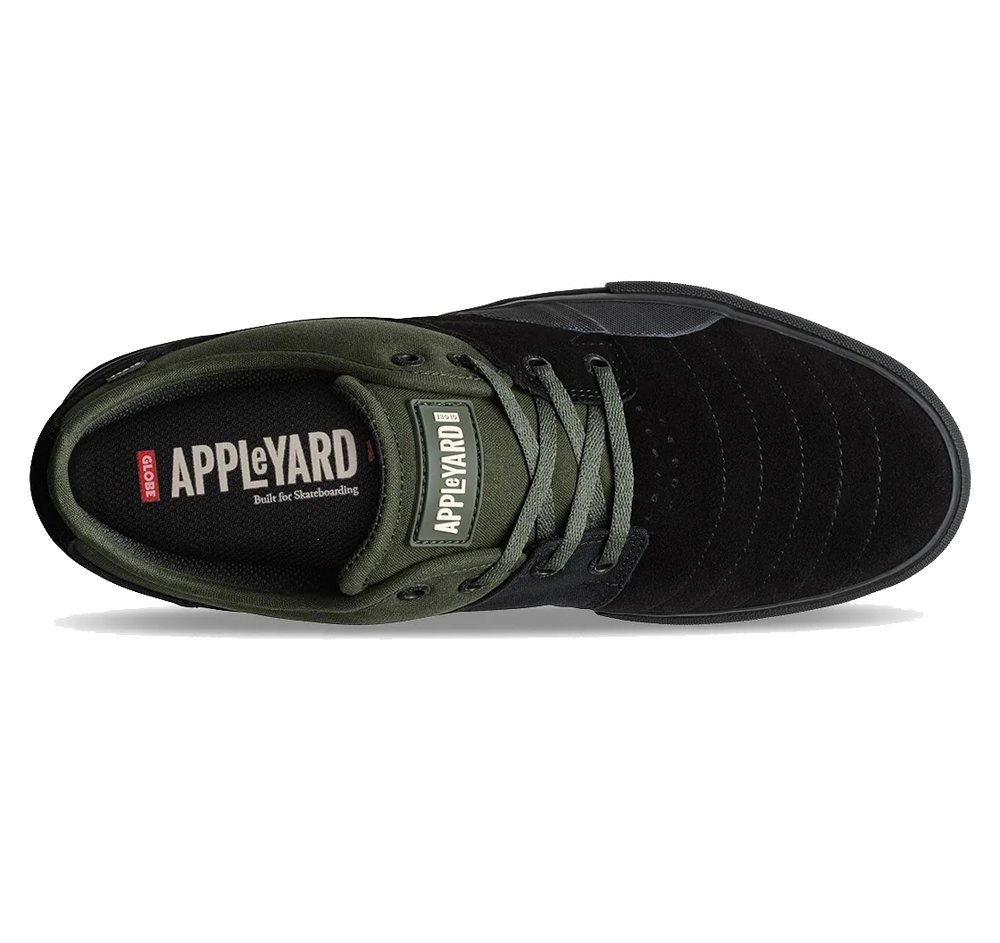 Black and green sneaker with 'APPLEYARD' branding on a white background