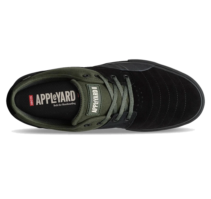 Black and green sneaker with 'APPLEYARD' branding on a white background