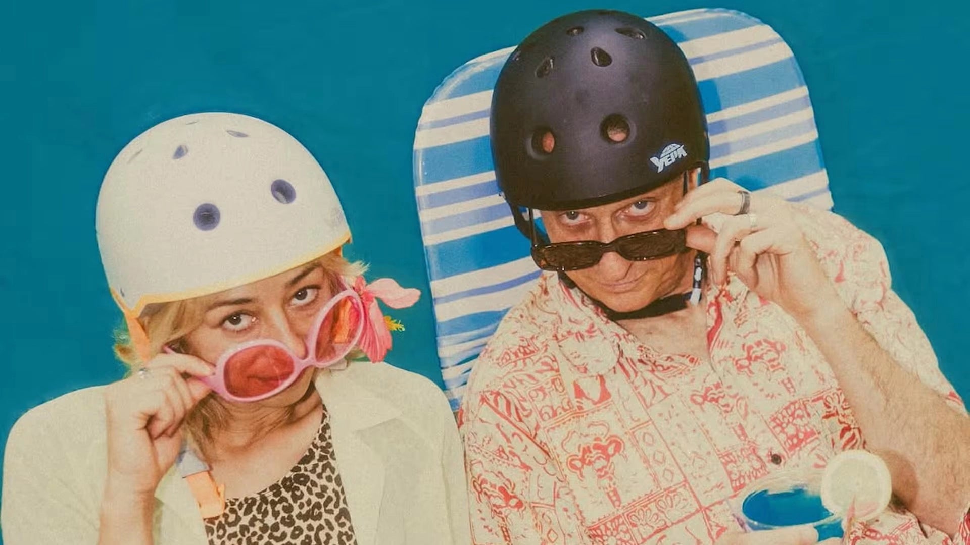 Skateboarders wearing Yepa skate helmets posing poolside, showcasing certified protective skate helmets for street and park skating