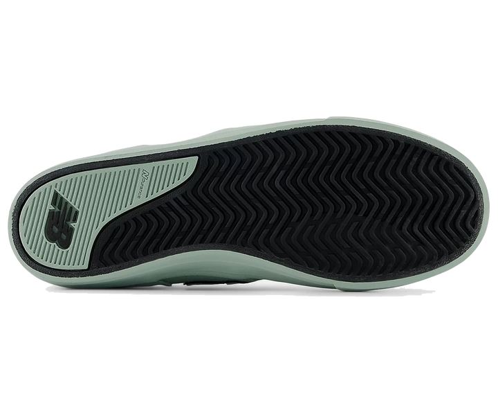 Sole of a shoe with a brand logo on a white background