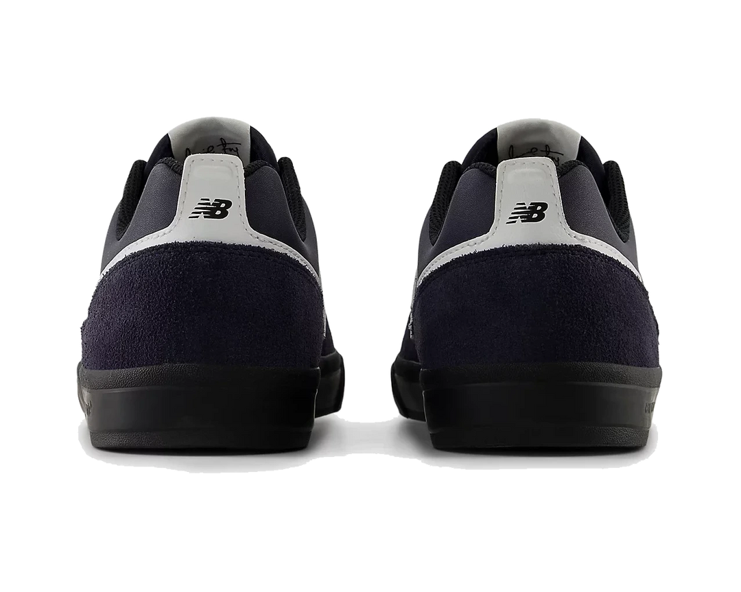 Black and gray sneakers with New Balance logo on a white background