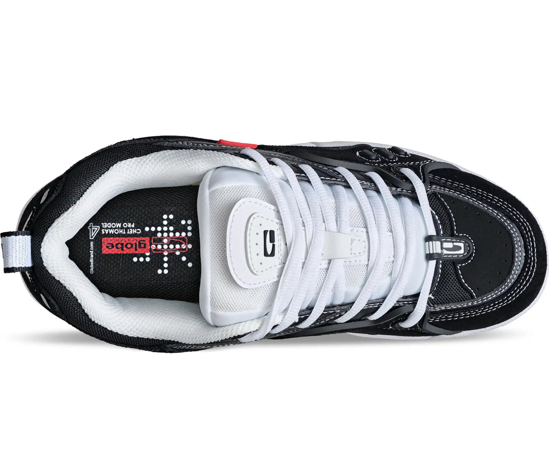 Black and white shoe with laces on a white background
