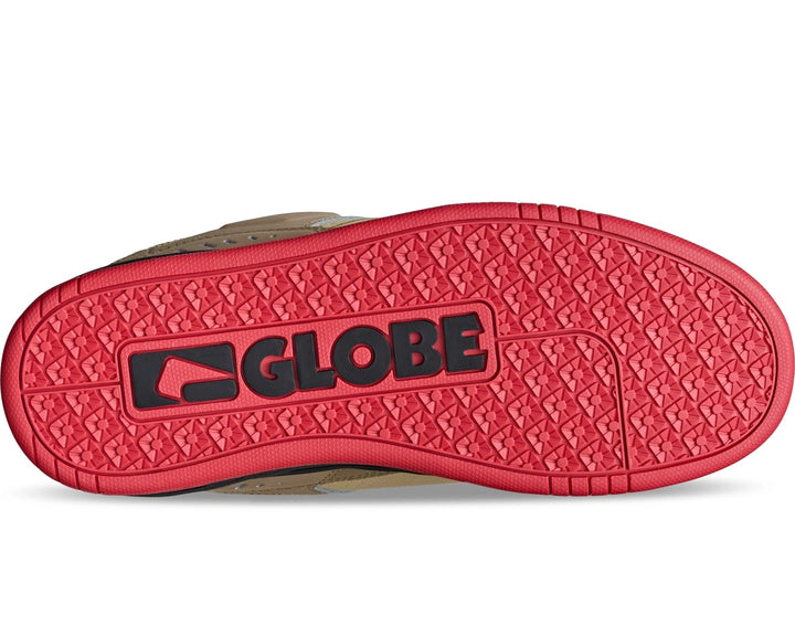 Red sole of a shoe with 'Globe' branding on a white background